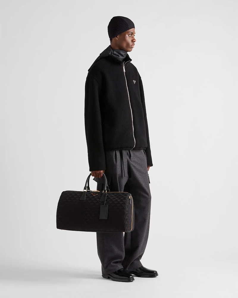 Embroidered fabric duffel bag