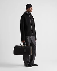 Embroidered fabric duffel bag