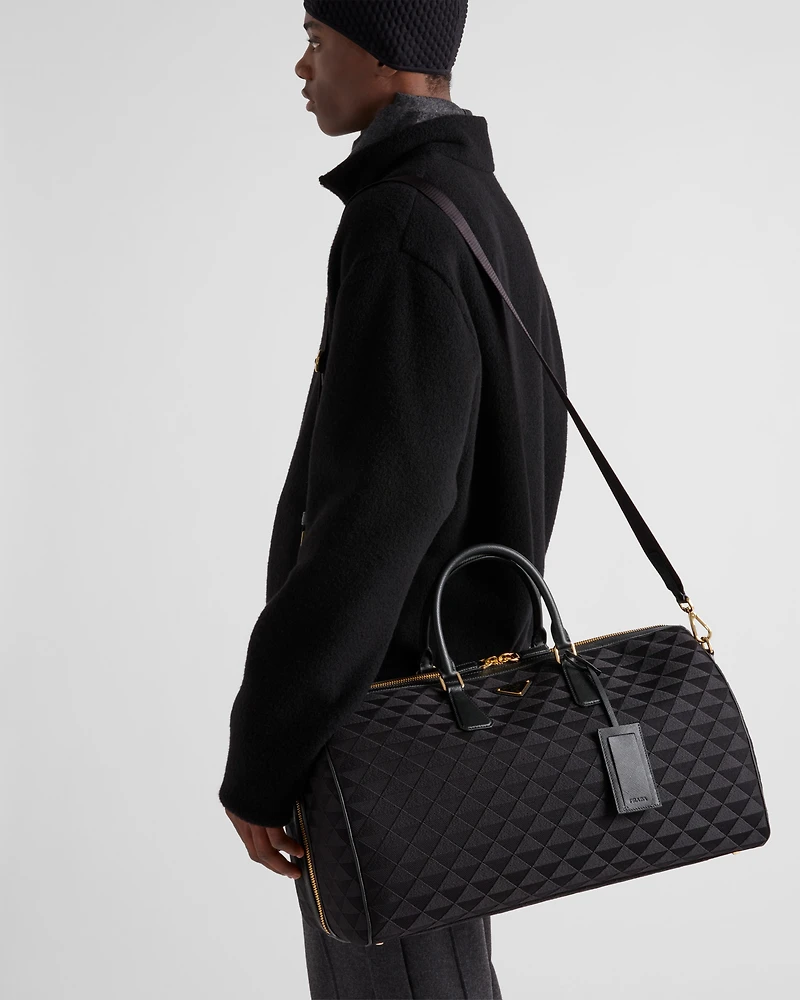 Embroidered fabric duffel bag