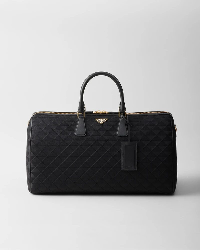 Embroidered fabric duffel bag