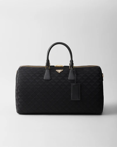 Embroidered fabric duffel bag