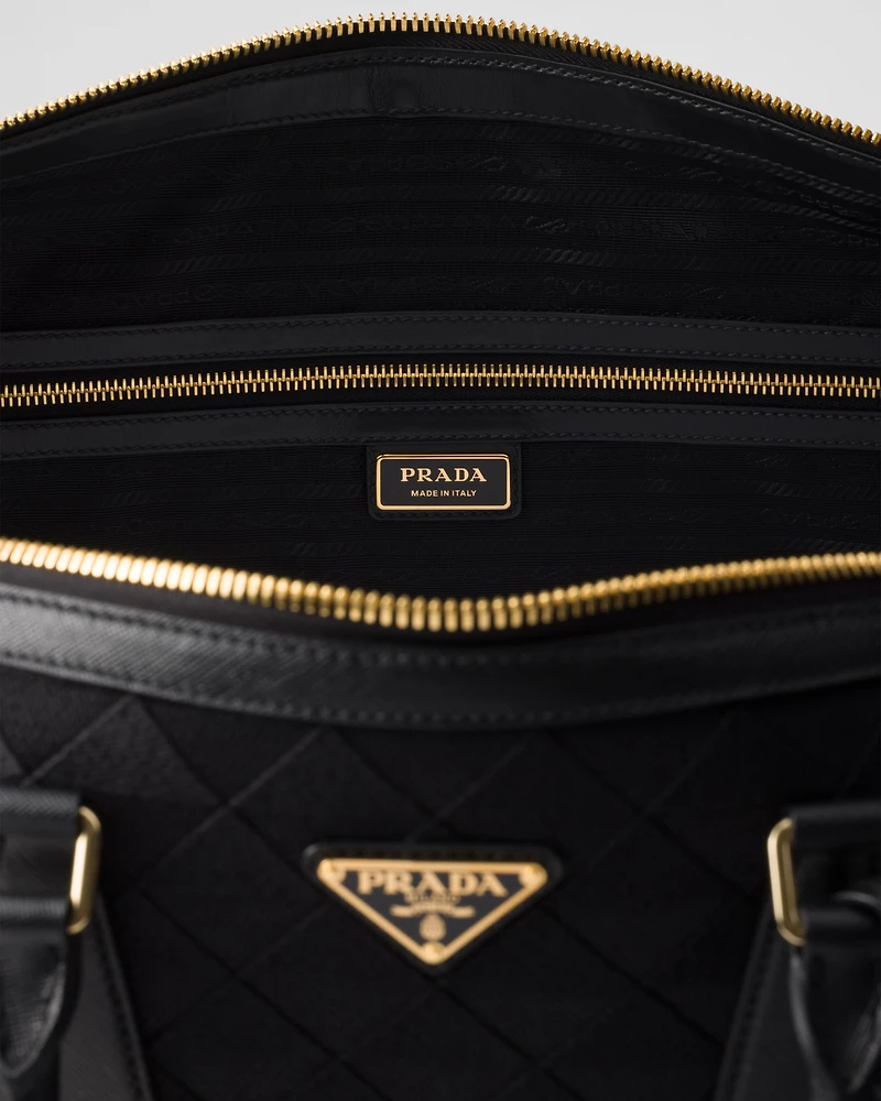 Embroidered fabric duffel bag