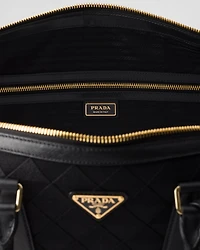 Embroidered fabric duffel bag