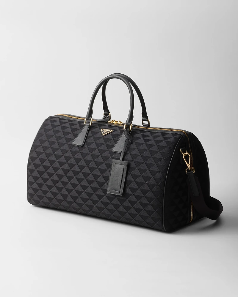 Embroidered fabric duffel bag