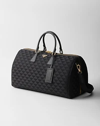 Embroidered fabric duffel bag