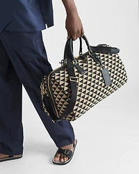 Large Prada Symbole embroidered fabric travel bag