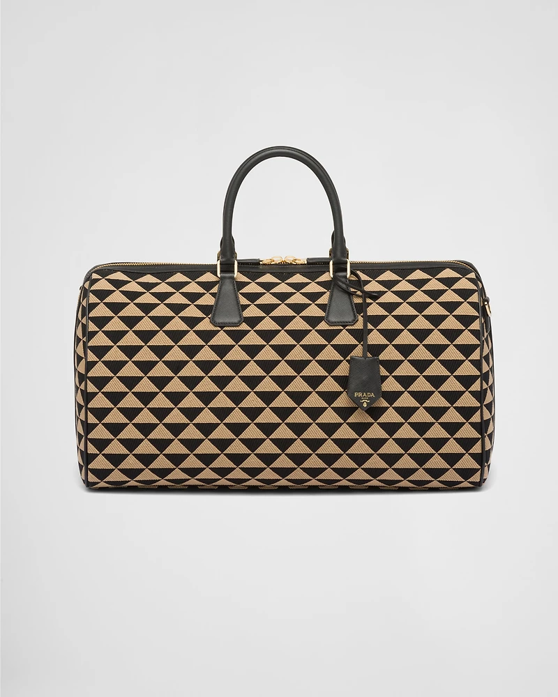Large Prada Symbole embroidered fabric travel bag