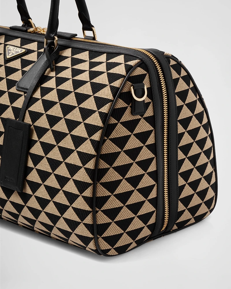 Large Prada Symbole embroidered fabric travel bag