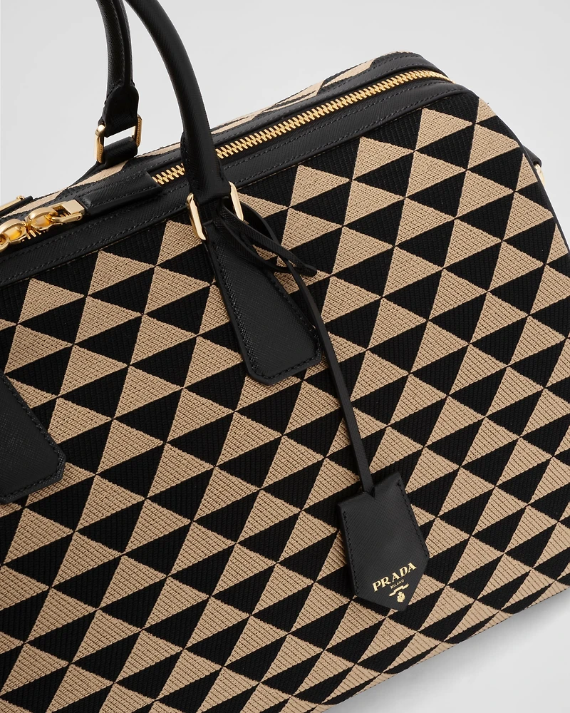 Large Prada Symbole embroidered fabric travel bag