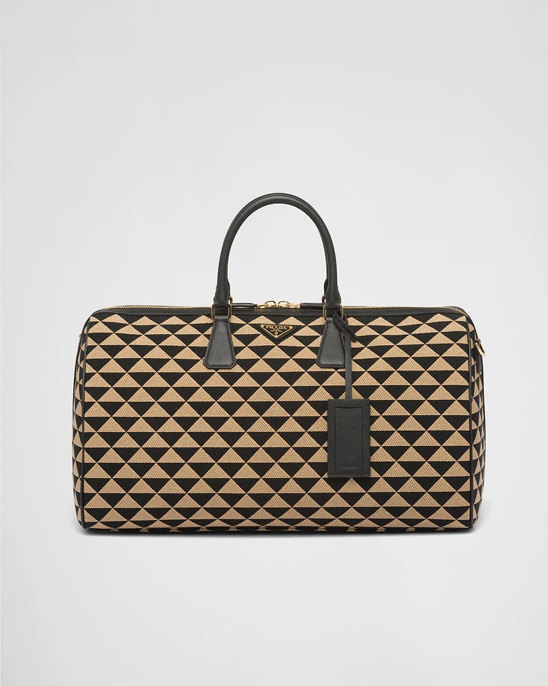 Large Prada Symbole embroidered fabric travel bag