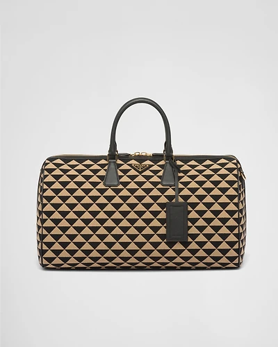 Large Prada Symbole embroidered fabric travel bag