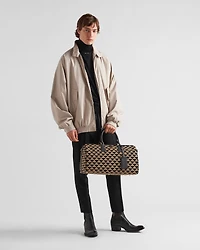Medium Prada Symbole embroidered fabric travel bag