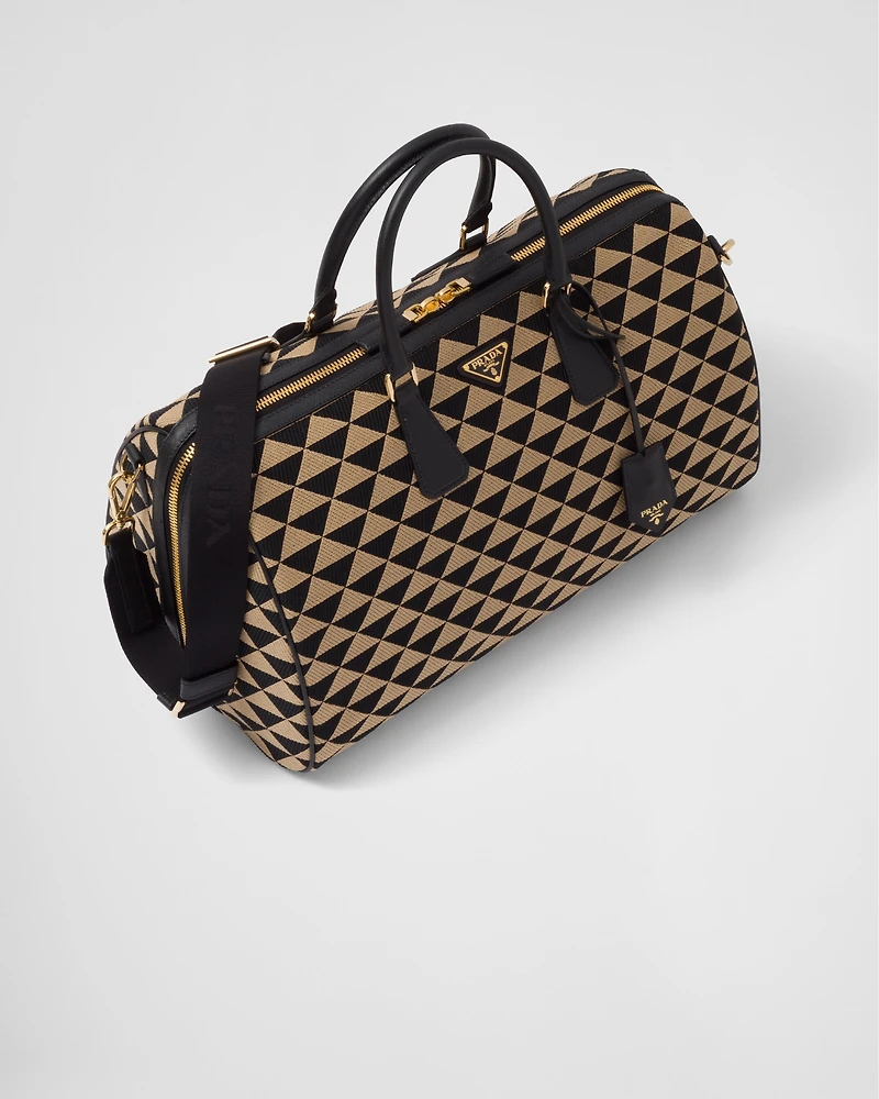 Medium Prada Symbole embroidered fabric travel bag