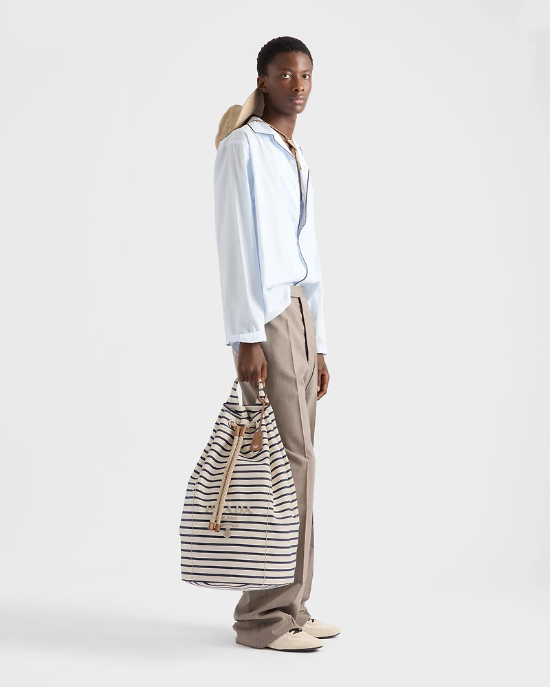 Striped canvas drawstring duffel bag