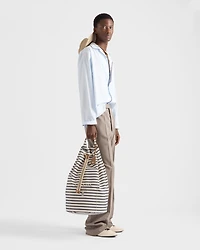 Striped canvas drawstring duffel bag