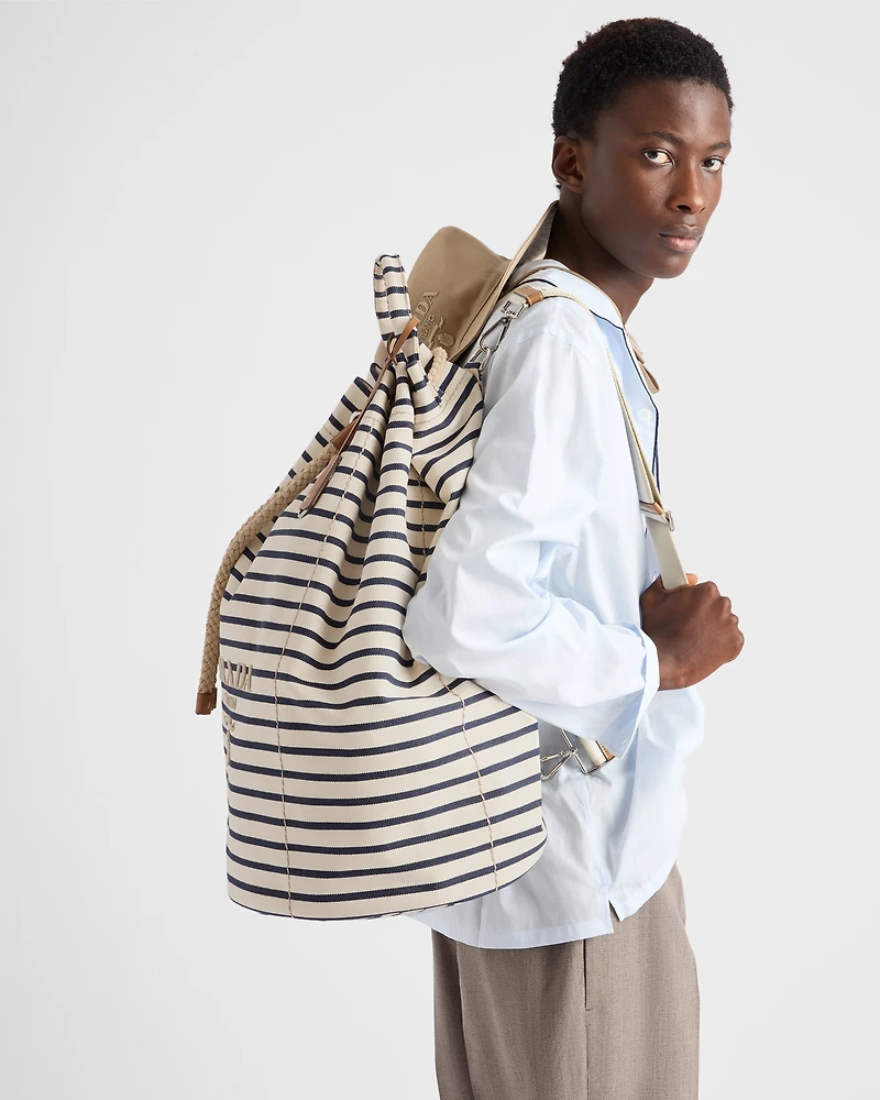 Striped canvas drawstring duffel bag