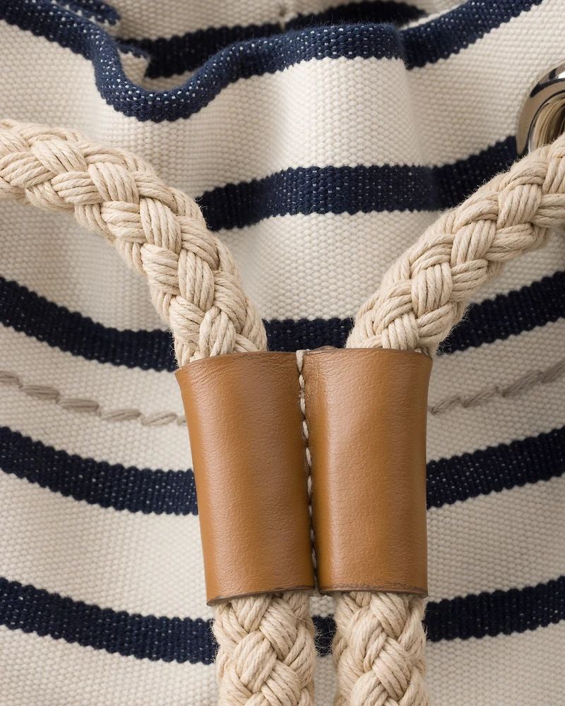 Striped canvas drawstring duffel bag