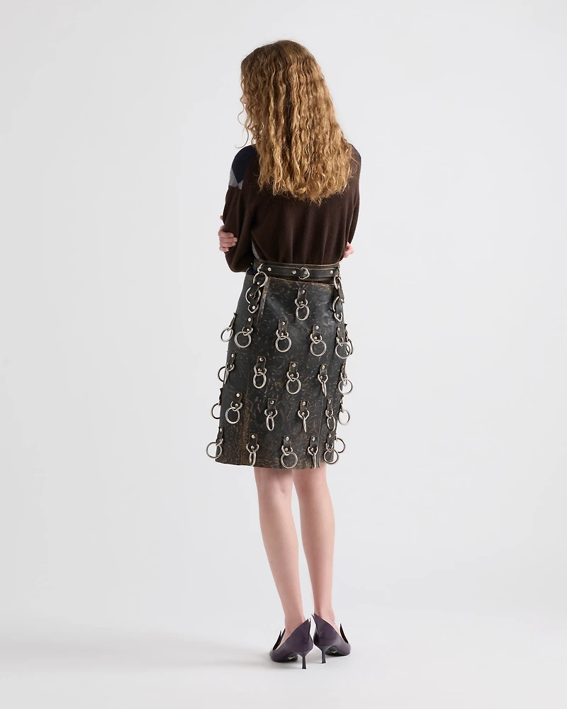 Leather miniskirt with metal rings