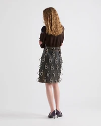 Leather miniskirt with metal rings