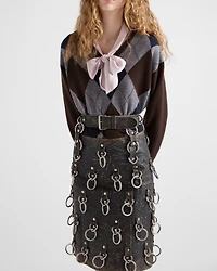Leather miniskirt with metal rings