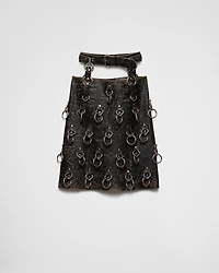 Leather miniskirt with metal rings