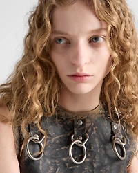 Leather dress with metal appliqués