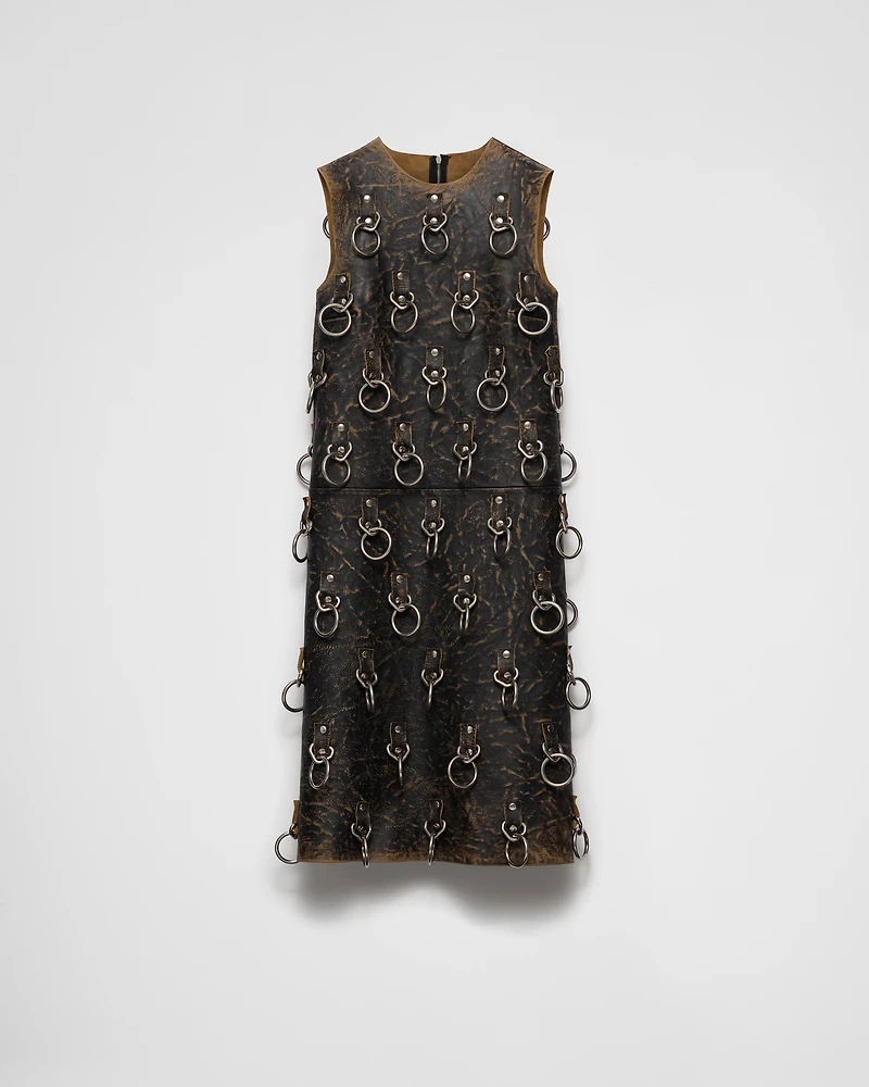 Leather dress with metal appliqués