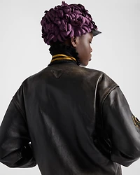 Leather bomber jacket with patch