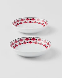 Set of two porcelain sauce bowls