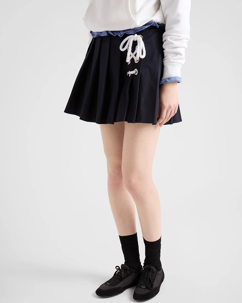 Pleated stretch drill miniskirt