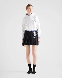 Pleated stretch drill miniskirt
