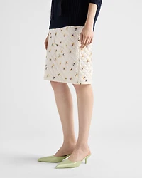Floral-print quilted satin skirt