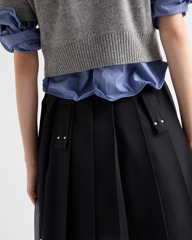 Pleated gabardine miniskirt with metal rings