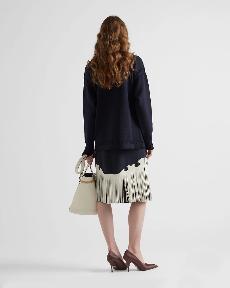 Rush stitch skirt with leather fringe