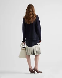 Rush stitch skirt with leather fringe