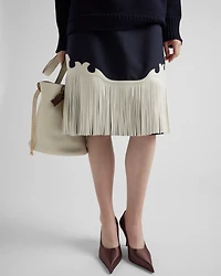 Rush stitch skirt with leather fringe