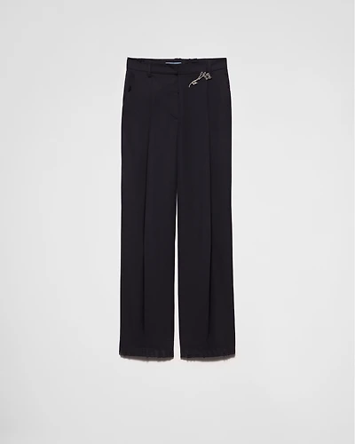 Old-wash gabardine pants with jeweled brooch