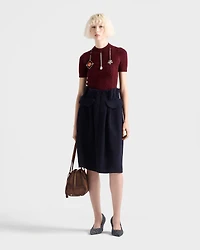 Short-sleeved wool sweater with pendants
