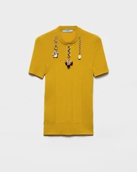 Short-sleeved wool knit sweater with pendants