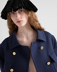 Double-breasted technical tricotine coat