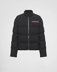 Cropped technical knit puffer jacket