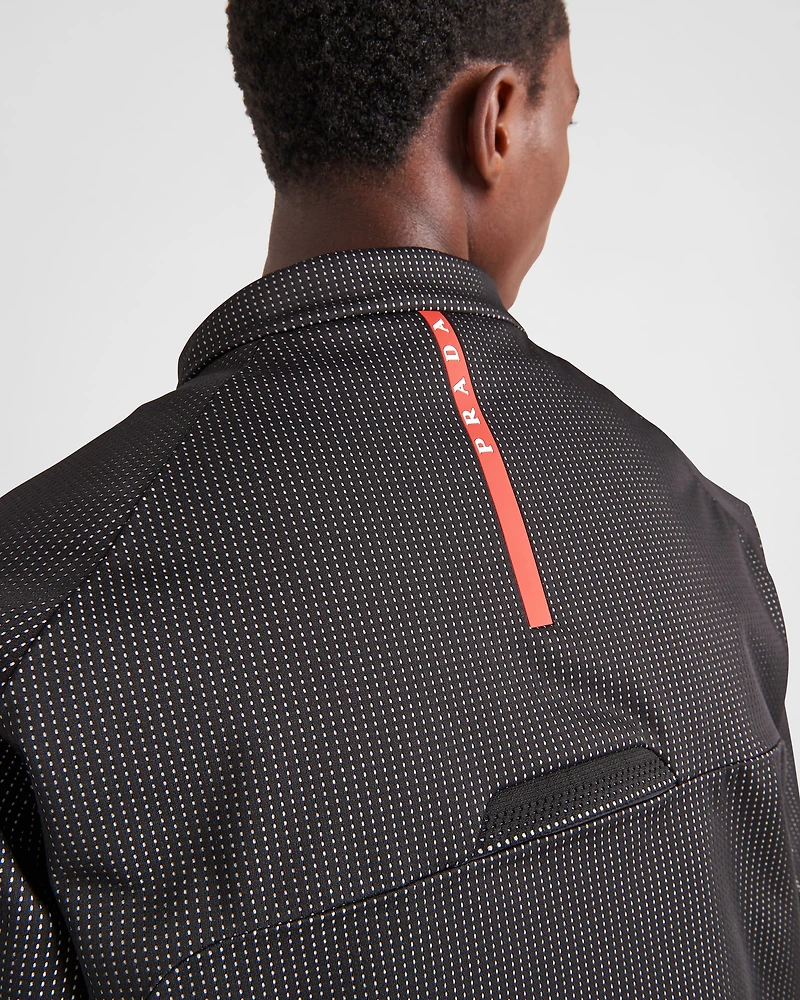Reflective fabric ski jacket