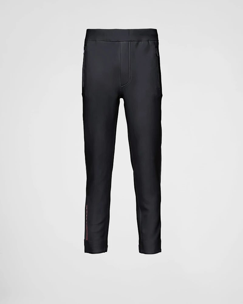 Technical fabric joggers with heat-sealed taped seams