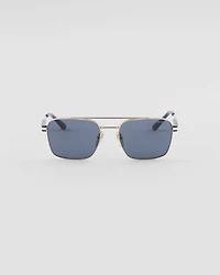 Sunglasses with iconic metal plaque