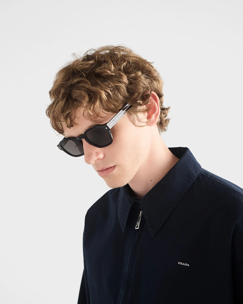 Sunglasses with the iconic metal plaque