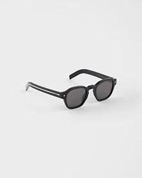 Sunglasses with the iconic metal plaque