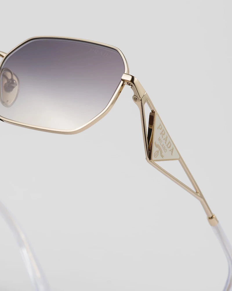 Sunglasses with Prada triangle logo