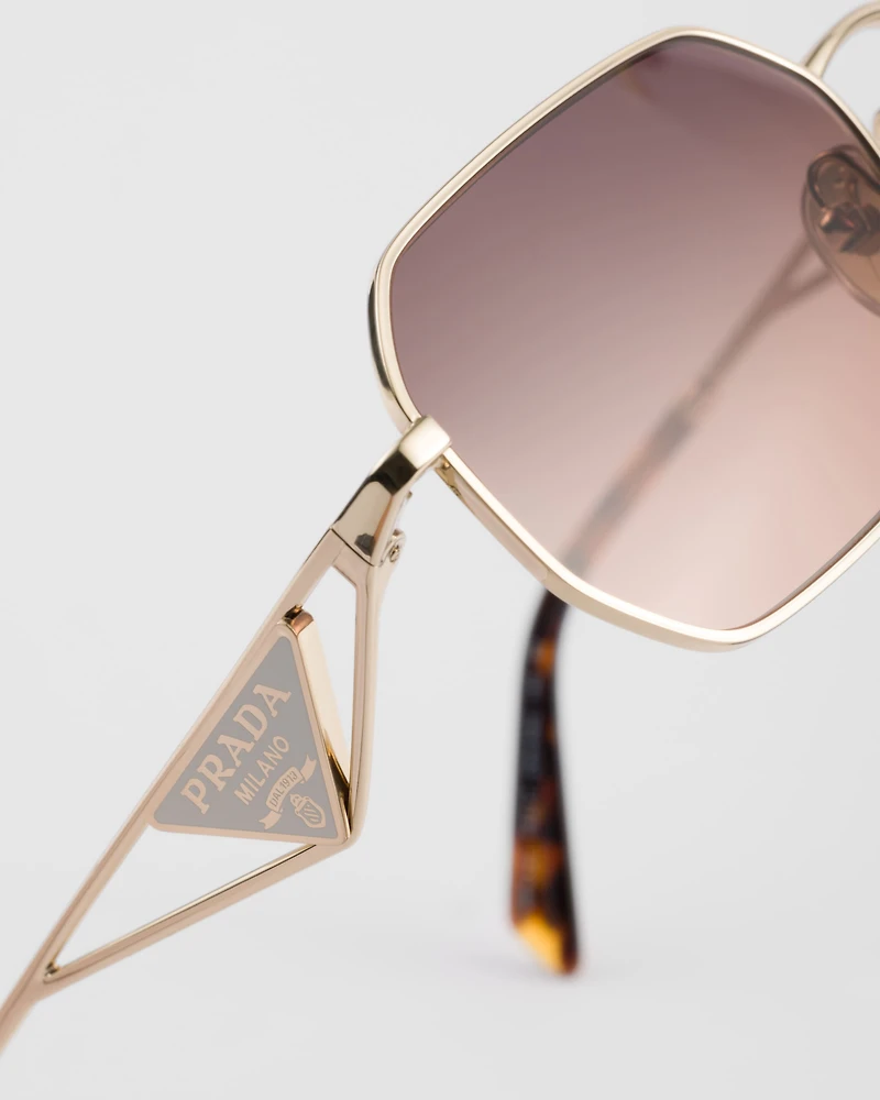 Sunglasses with Prada triangle logo