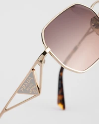 Sunglasses with Prada triangle logo