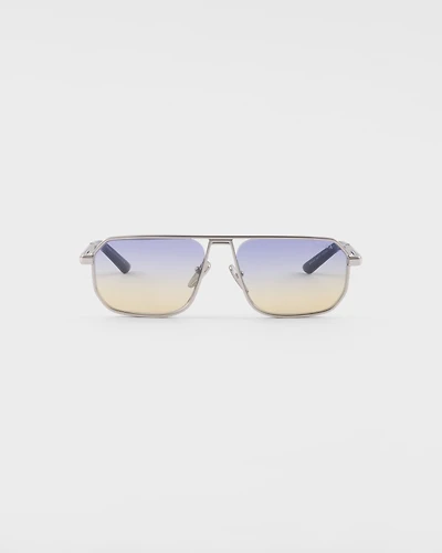 Sunglasses with the iconic metal plaque